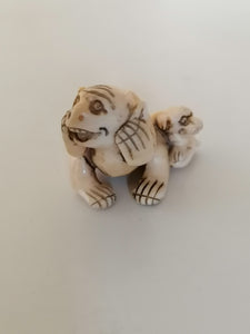 Netsuke japonais fin XIXème dans le style archaïque