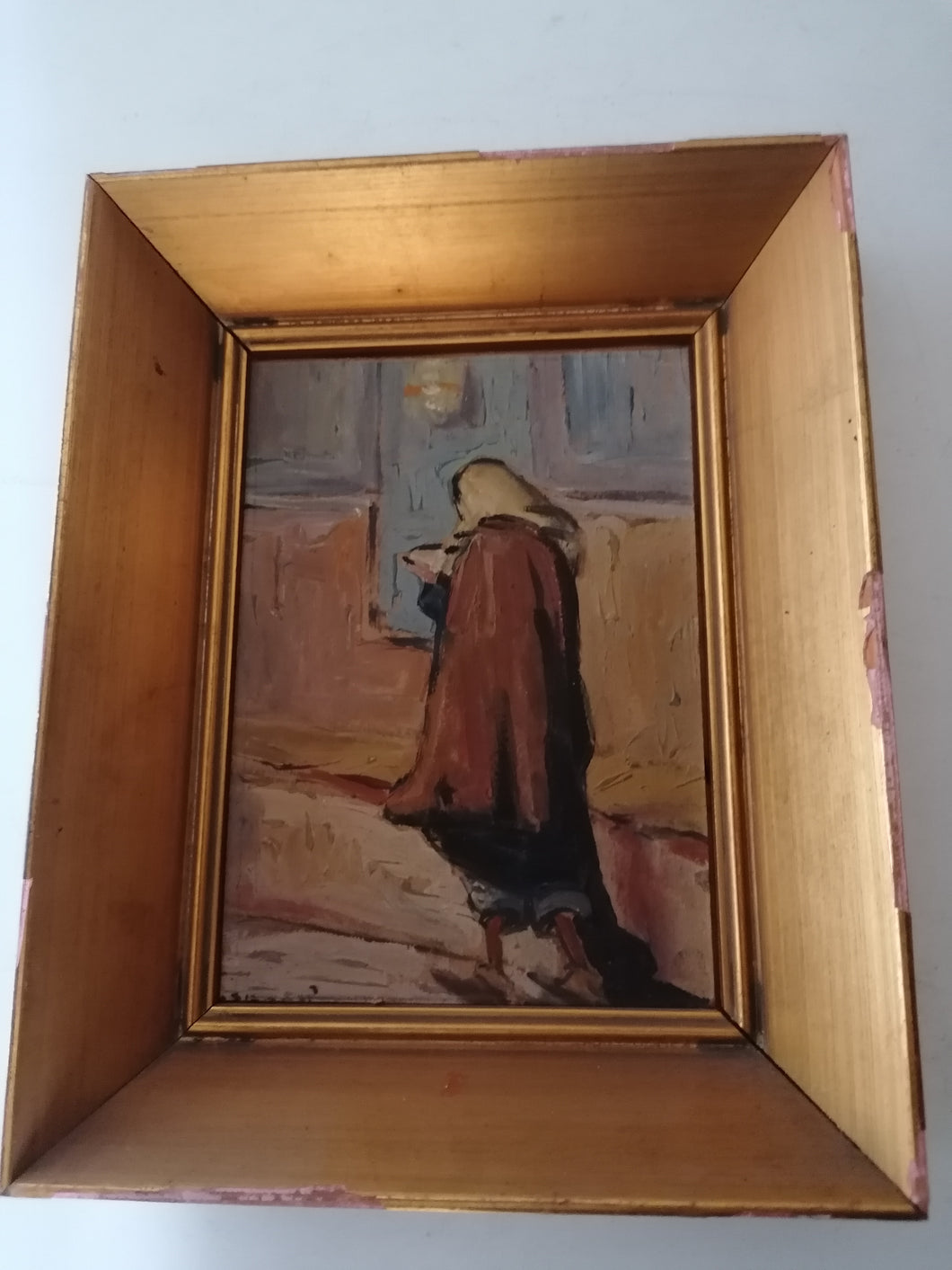 Huile sur carton mileu XXème femme pieuse dans une église.