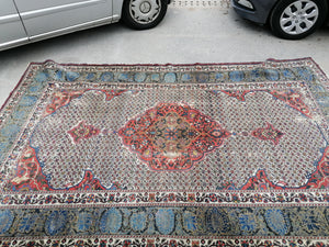 Grand Tapis perse bakhtiari laine noué main. Vers 1920.