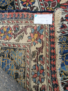 Grand Tapis perse bakhtiari laine noué main. Vers 1920.