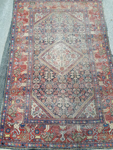 Tapis perse farahan vers 1900. Laine noué main avec usure