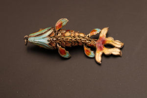 Pendentif poisson articulé en filigrane argent et émail de couleurs. Quelques éclats sur l'émail