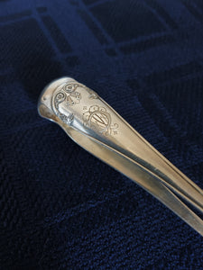 Grande pince à sucre en argent massif Français Minerve , style empire