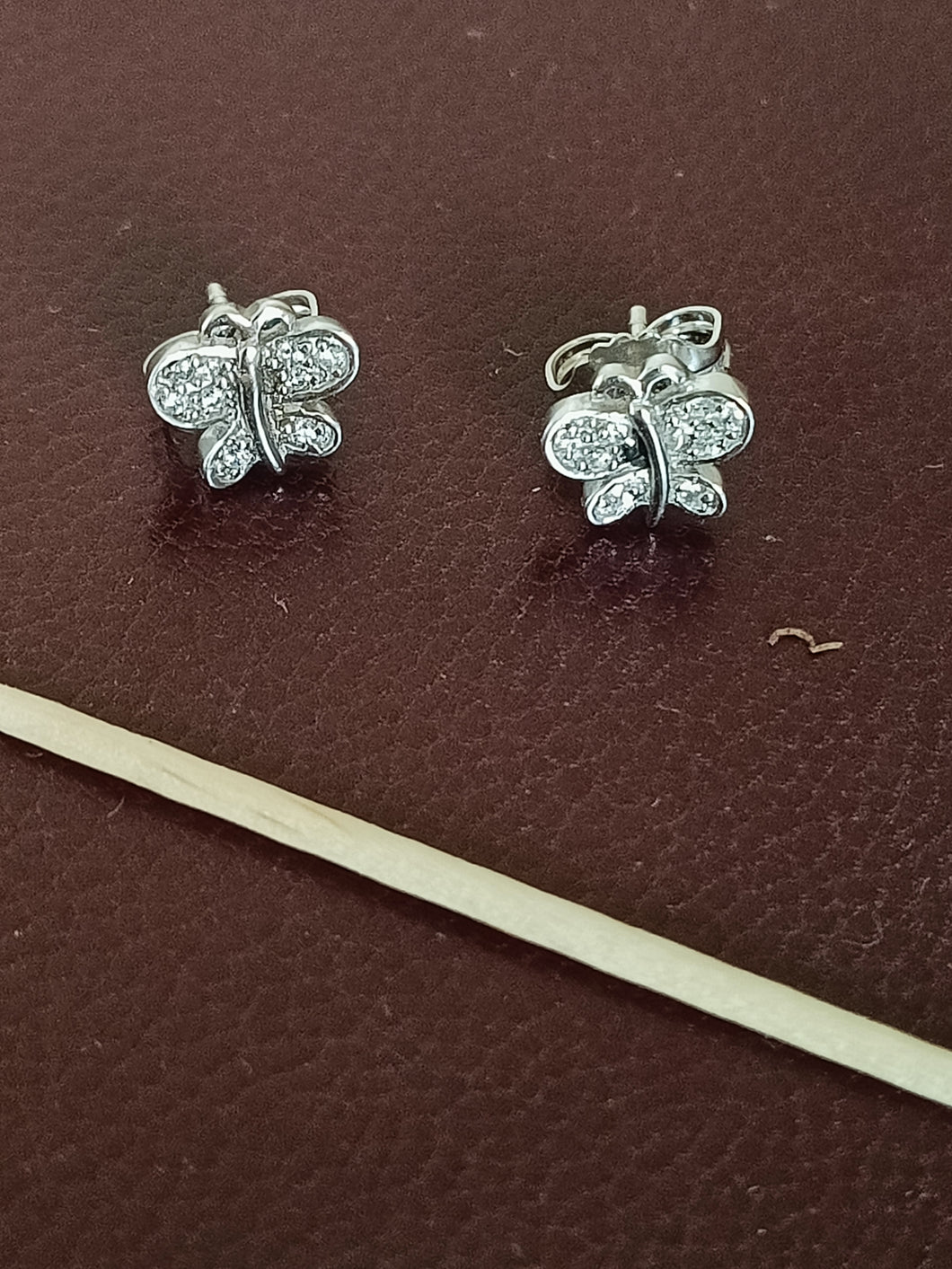 Paire de petit clou d'oreille papillon en argent doré