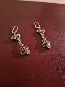 Paire de boucle d'oreille en argent doré et cristal taillé .