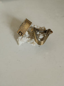 Paire de boutons de manchette art déco. Argent doré