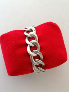 Bracelet gourmette argent massif, début XXème. maille pleine