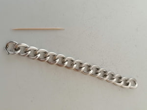 Bracelet gourmette argent massif, début XXème. maille pleine