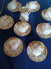 Charger l&#39;image dans la galerie, Service à café 9 pièces en porcelaine de Havilland France pour la boutique Louis Kuhne à Genève. Début 1900
