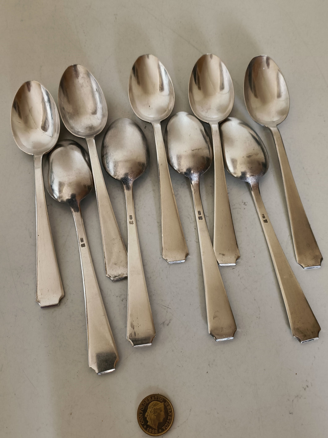 Jezler modèle Lady,série de 9 cuillères à thé en argent massif 0.800