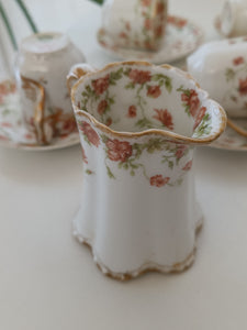 Service à café 9 pièces en porcelaine de Havilland France pour la boutique Louis Kuhne à Genève. Début 1900