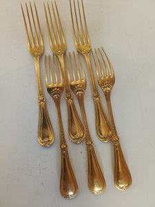 Christofle argenté et vermeil, série de 6 fourchettes à entre mets.