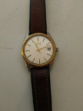 Charger l'image dans la galerie, Montre Oris quartz homme , boîtier en acier et cadran doré. Vers 1970-80. Bracelet cuir
