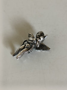 Paire de pendentif chérubin au dauphin, probablement pour décoré des bracelet que à mettre sur un collier .. l'un n'empêche pas l'autre