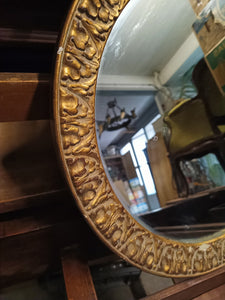 Miroir rond à palmettes style XIXE restauration 

Doré à la feuille d'or