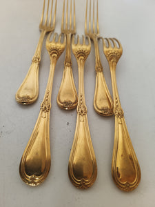 Christofle argenté et vermeil, série de 6 fourchettes à entre mets.