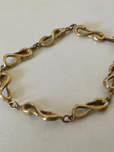 Rare bracelet à double col de cygne en laiton probablement XIXÈME réparation au fermoir dans les règles de l'art