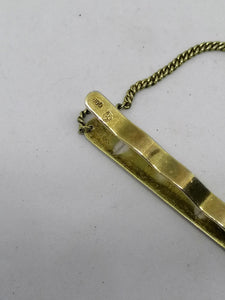 Pince à cravatte argent vermeil.