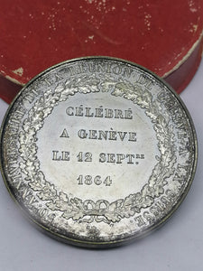Médaille 50ème de Genève à la Suisse.