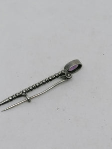 Broche à kilt ancienne avec améthyste taillé.
