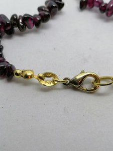 Collier grenat et métal doré