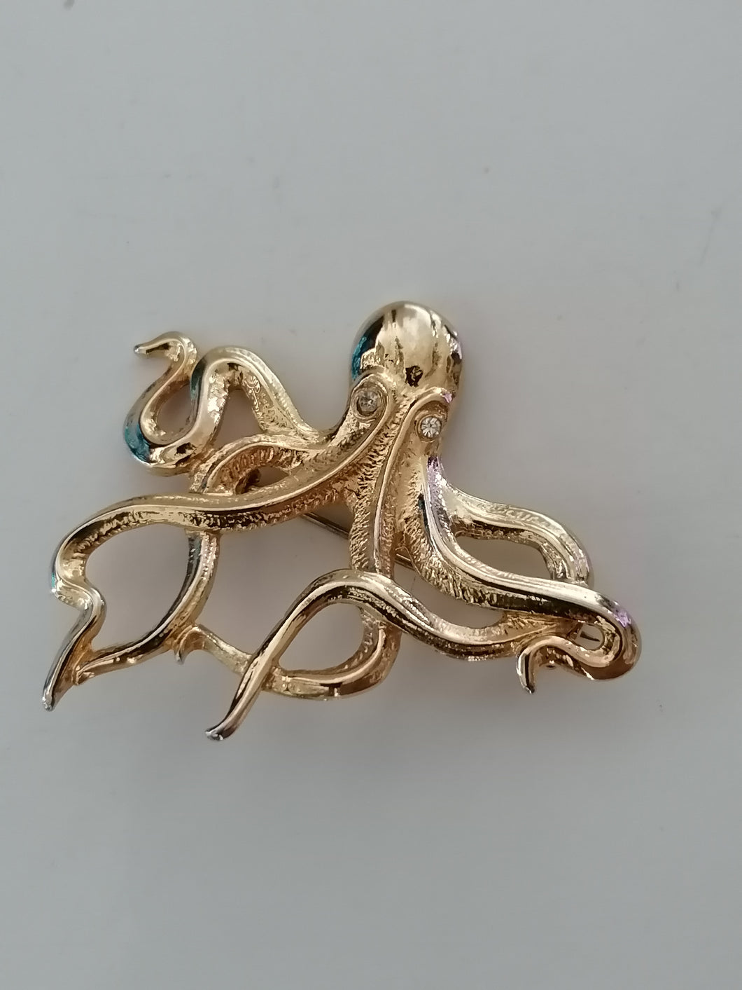 Broche pieuvre métal doré 