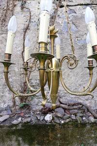 Lustre en bronze style Louis XVI à trompette