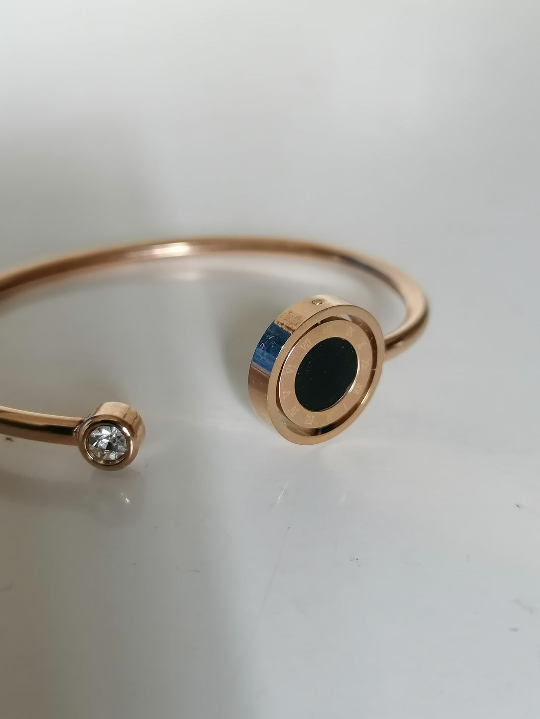 Bracelet jonc doré avec cadran réversible 