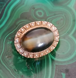 Belle broche cabochon œil de chat or 14k