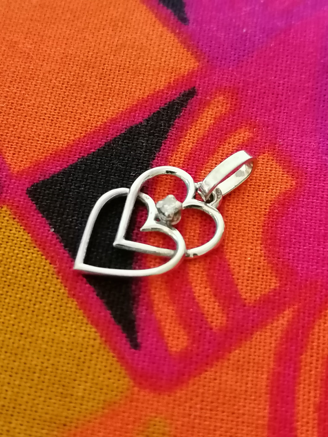 Pendentif double cœur en or 18k avec petit diamant 