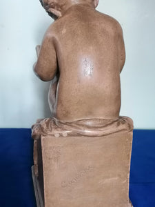 Amour en terre cuite signé CANOVA
