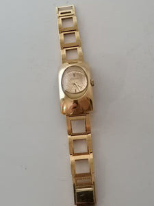 Sicura Montre vintage mécanique doré avec verre bombé.