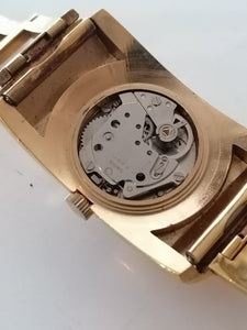 Sicura Montre vintage mécanique doré avec verre bombé.