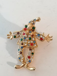 Broche doré clown parfait état