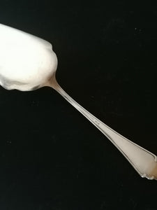 Pelle à gâteau argenté