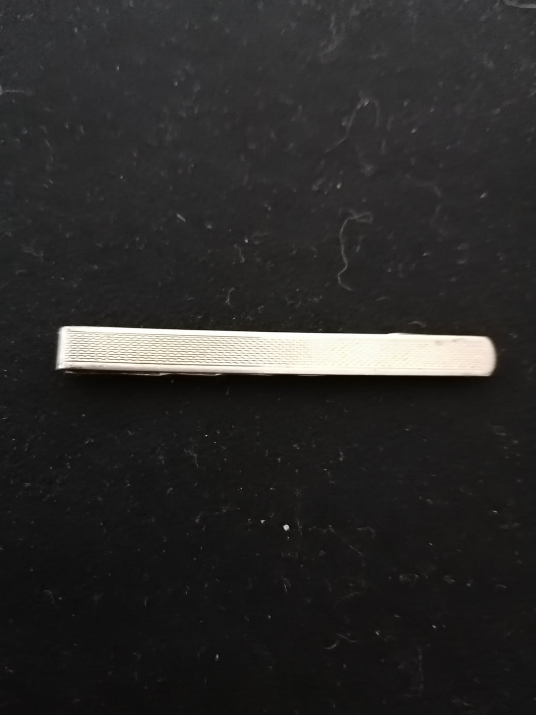 Pince à cravate en argent doré 