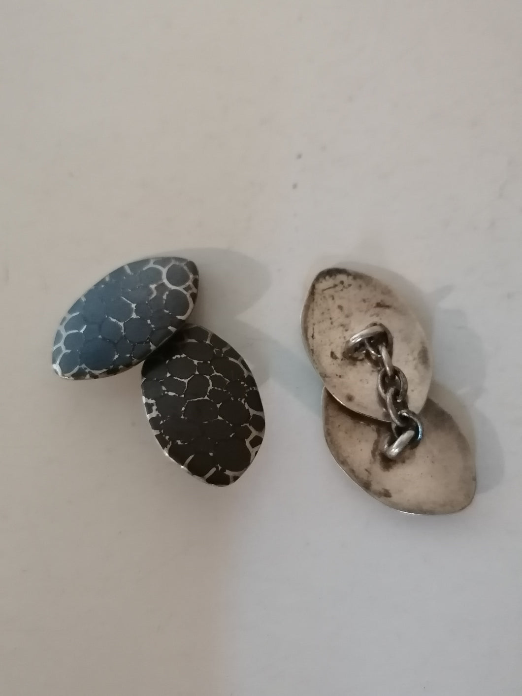 Paire de bouton de manchette en argent niellé. 