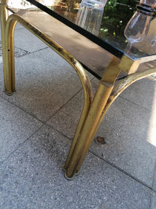 Table basse année 70 laiton doré avec double plateaux en verre fumé