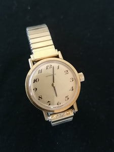 Longines mécanique femme,  doré.