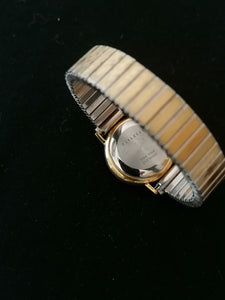 Longines mécanique femme,  doré.