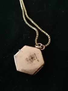 Pendentif doré souvenir photos vers 1930