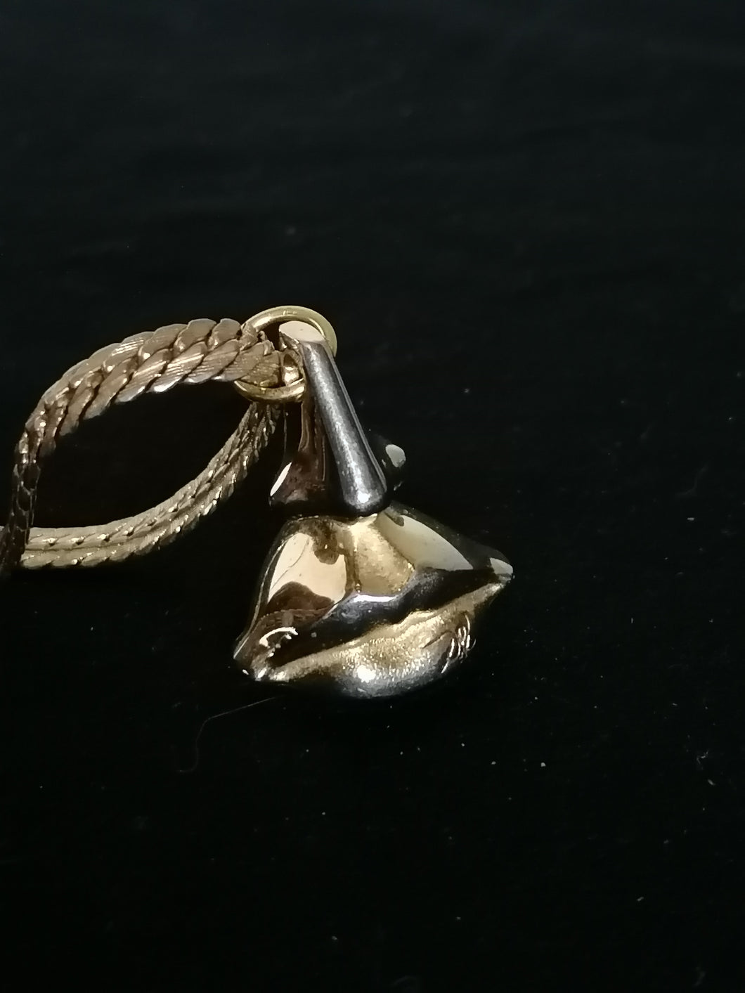 Dali bijoux doré visage signé