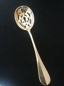 Christofle doré (vermail) cuillière à olive  parfait état.