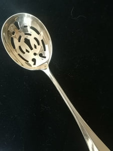 Christofle doré (vermail) cuillière à olive  parfait état.