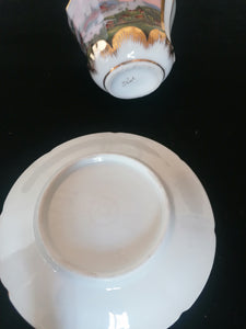 Tasse et sous tasse peinte à la main, porcelaine Allemande représentent la vielle de Kiel