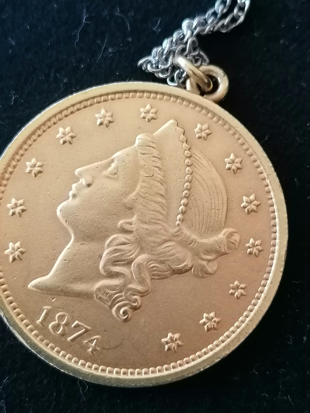 Médaille Piaget doré. 