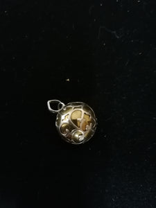 Bola en argent et laiton, jolie son. 