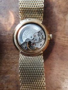 Bucherer automatique femme, modèle 1960 doré.