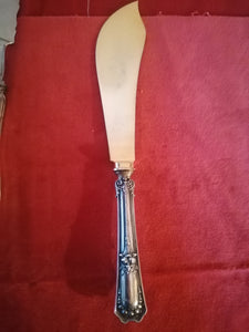 Coûteau à pâtisserie manche argent Jezler et lame doré. Parfait état.