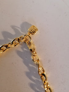 Givenchy Collier doré fantaisie parfait état, motif flacon parfum